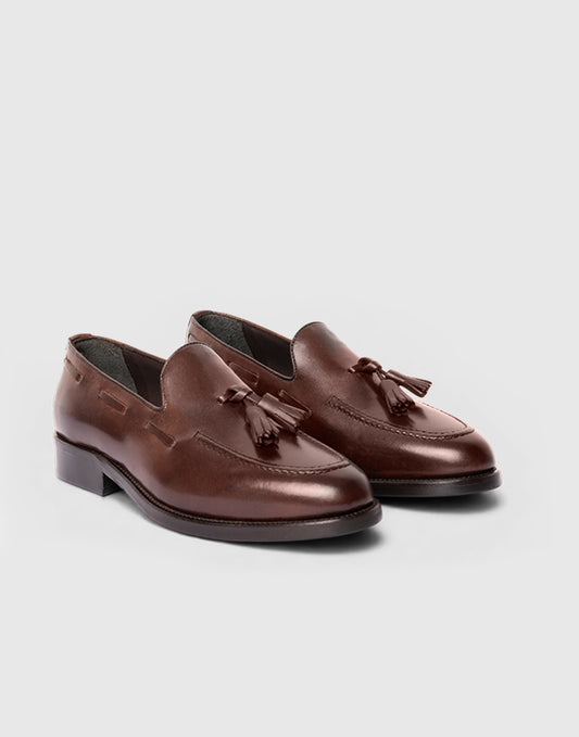 Brauner Tassel Loafer aus Leder mit Quasten