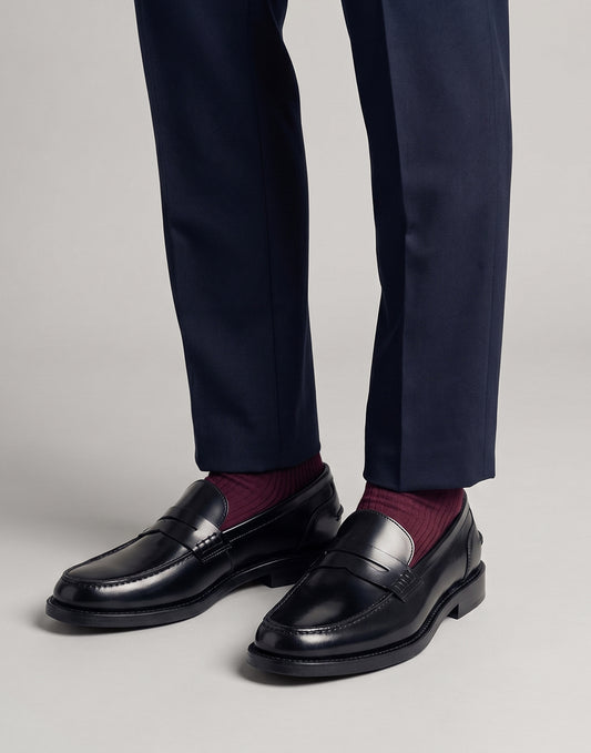 Schwarzer Penny Loafer aus gebürstetem Leder